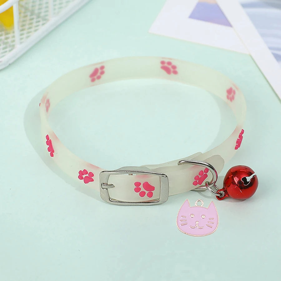 "Glow-in-the-Dark Pet Collar - Adjustable Luminous Collar with Paw Charm"