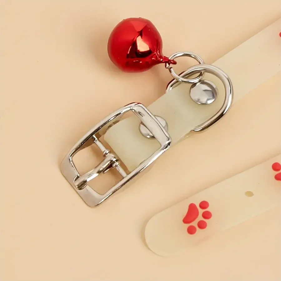 "Glow-in-the-Dark Pet Collar - Adjustable Luminous Collar with Paw Charm"